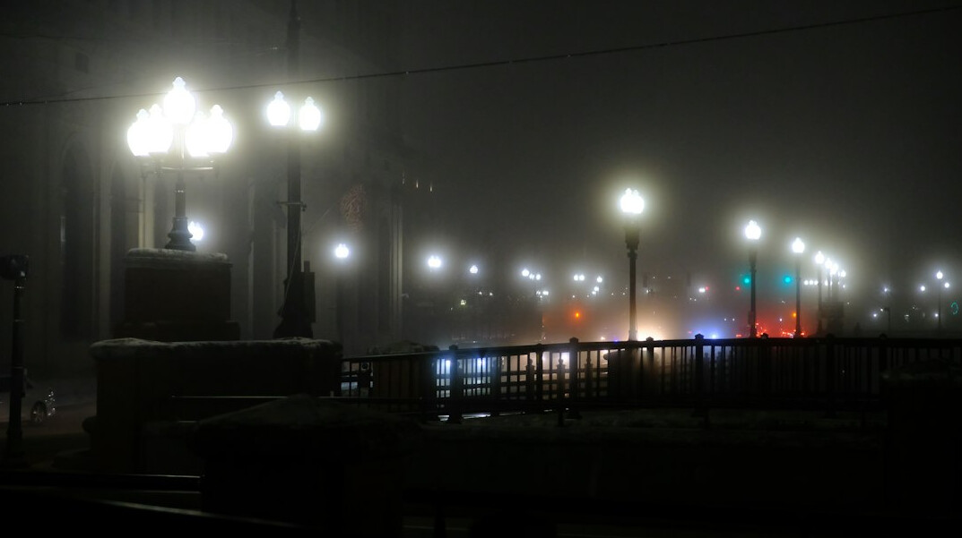foggy city street at night